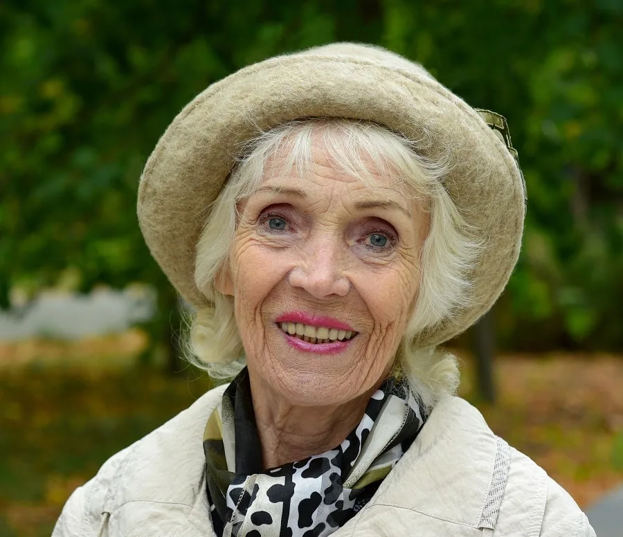 wedding hairstyle with hat for grandmothers