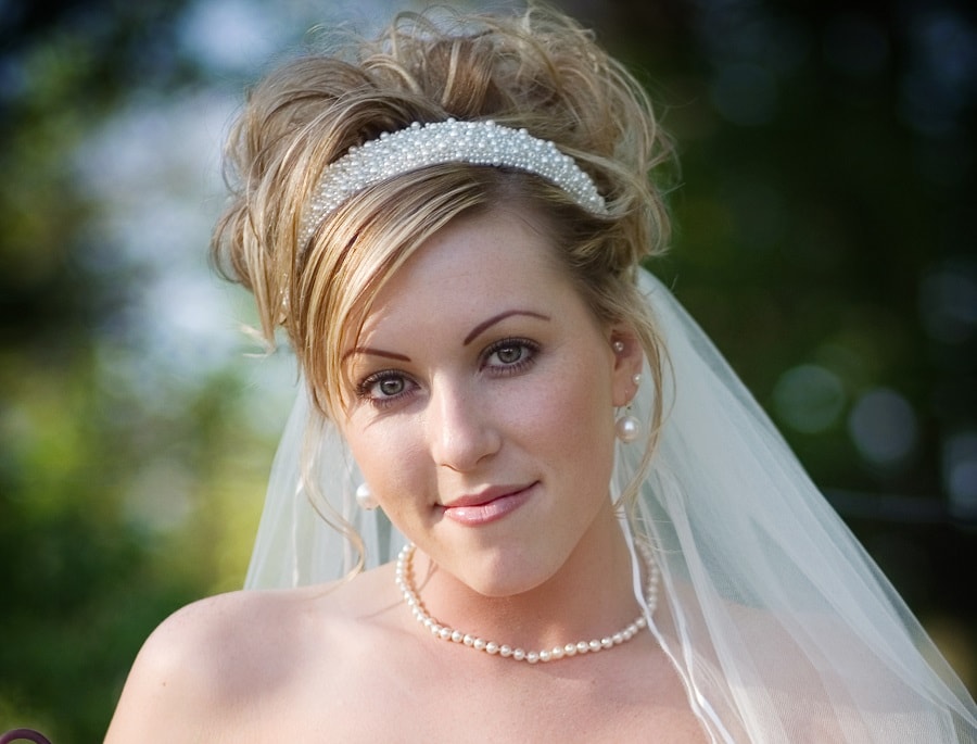 wedding hairstyle with headband and side bangs