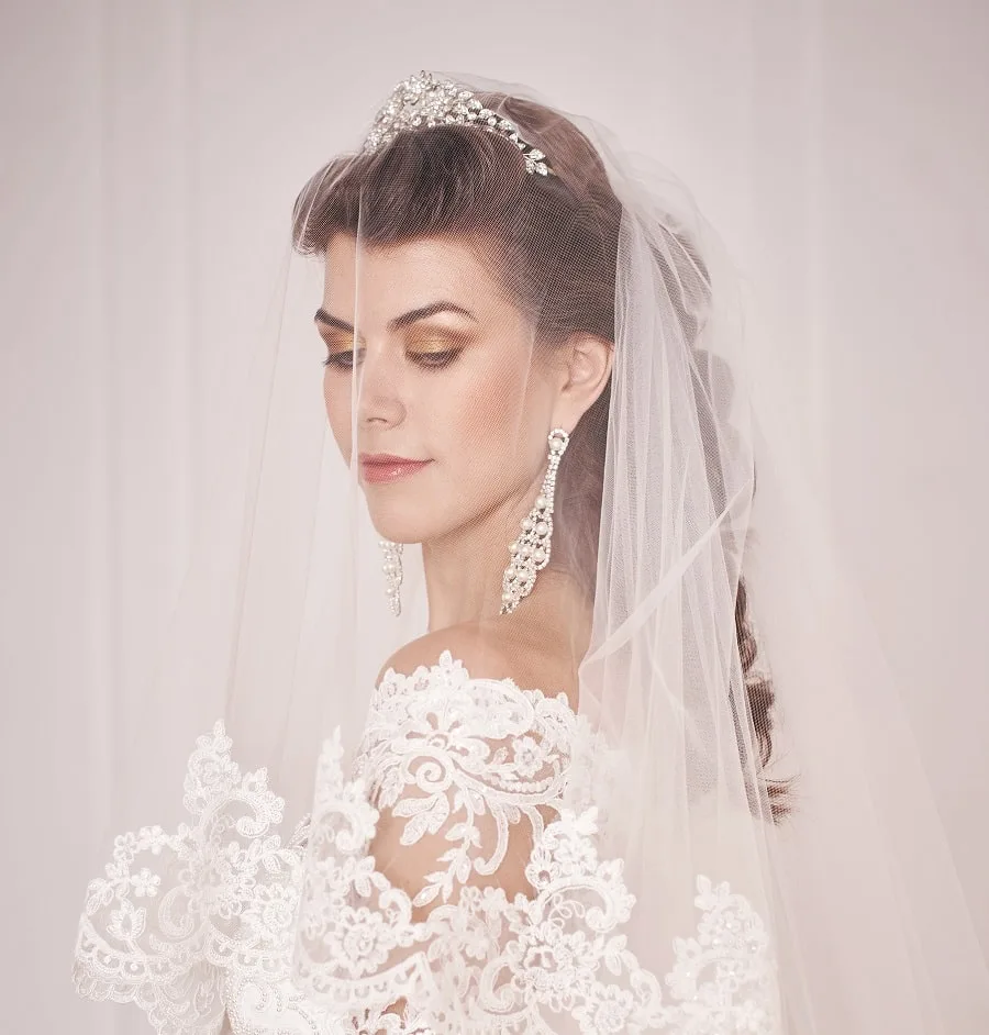 wedding hairstyle with tiara veil and blusher