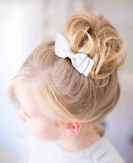 wedding hairstyle with bun for little girl