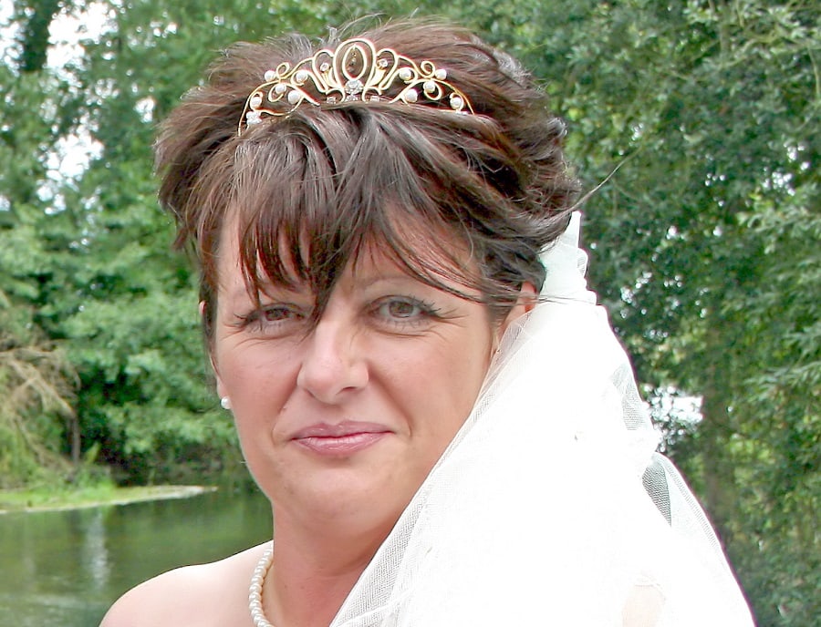 wedding updo with bangs for bride over 50