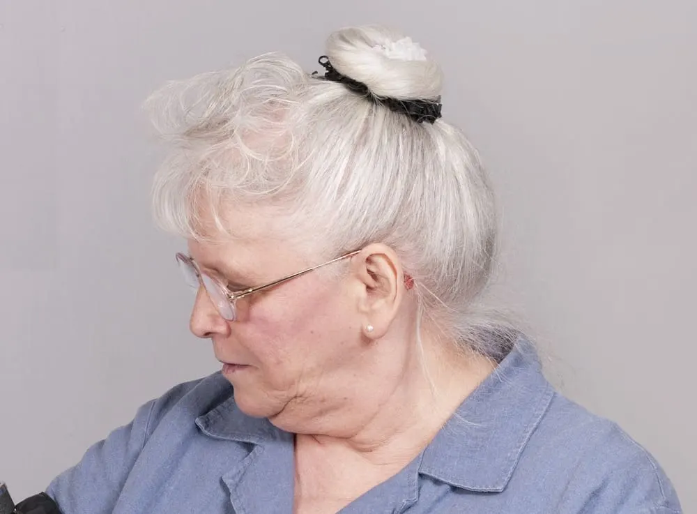 white hair bun for women over 50