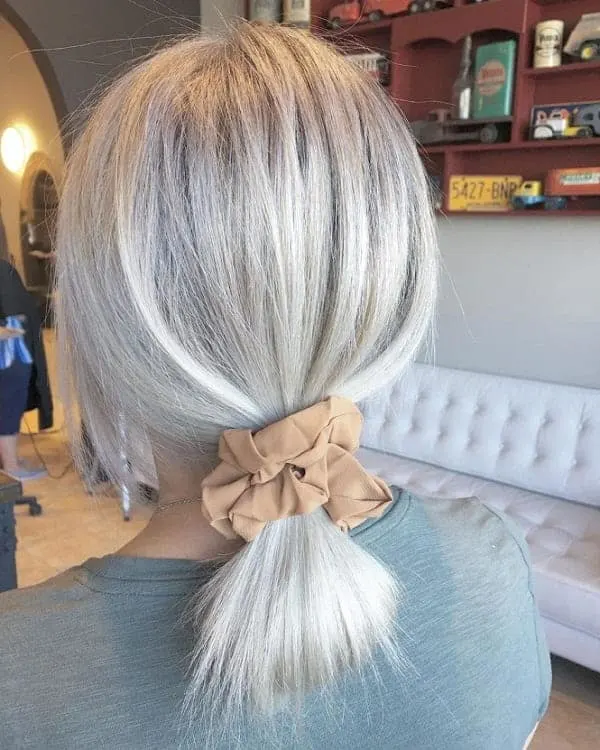 low ponytail with white hair for woman