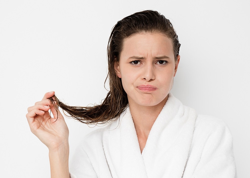 why does hair looks thinner after washing?