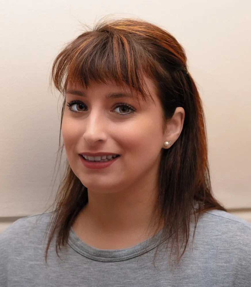 wispy bangs hairstyle for 30 year old woman