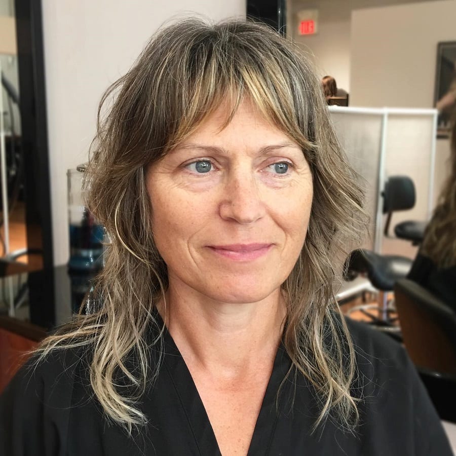 wolf cut with curtain bangs for women over 50