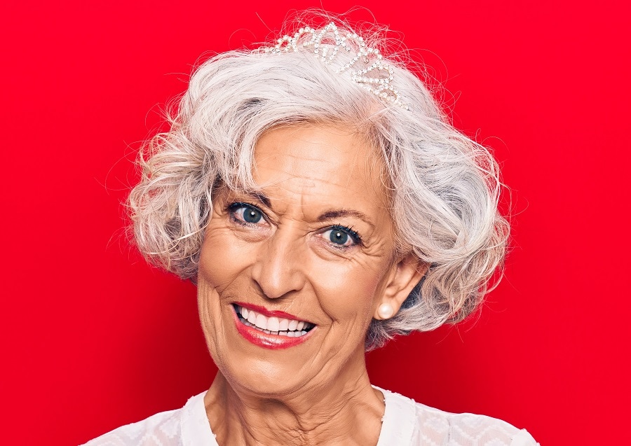woman over 60 with curly blonde hair