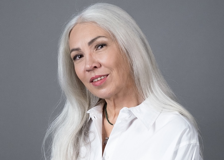 woman over 60 with long white hair