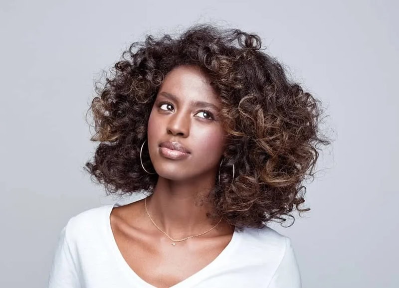 black woman with layered multi-textured curls