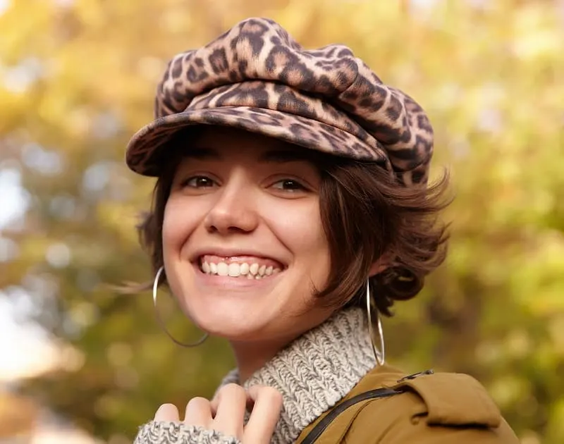 woman with newsboy cap