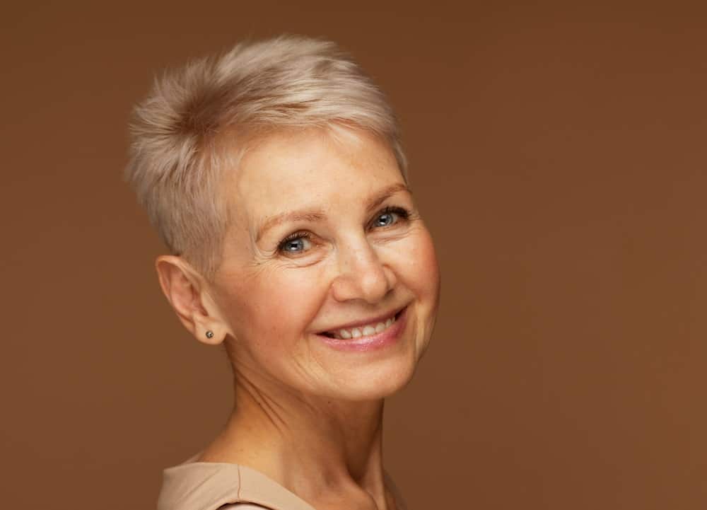 women over 60 with short fine haircut 