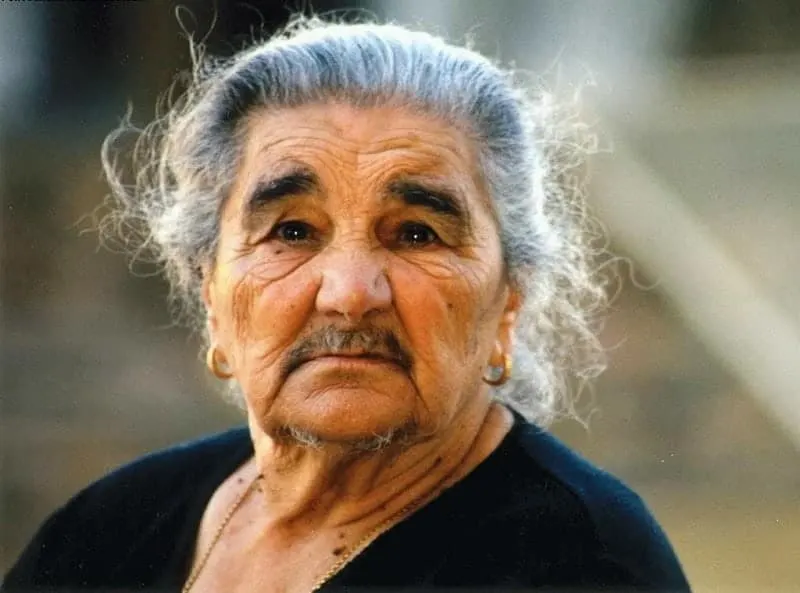 older lady with mustache