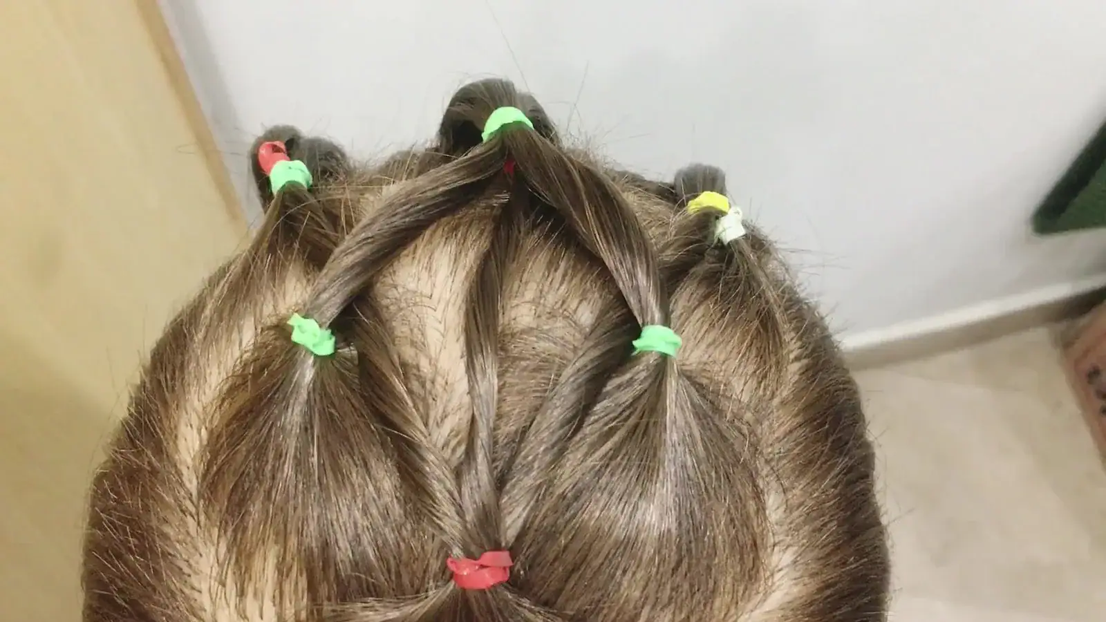 Finished crisscross overlay from the tutorial video with twisted diagonals and a centered vertical strand.