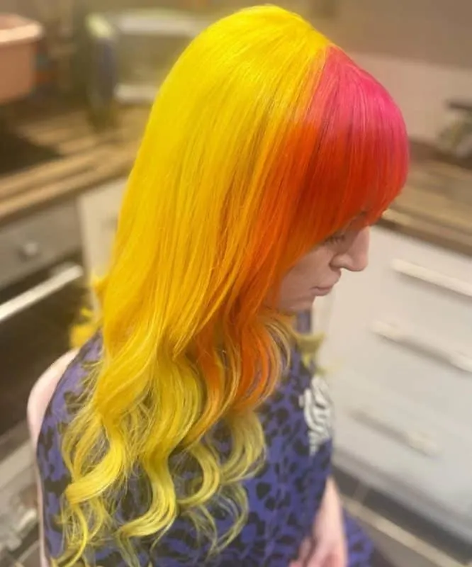 half and half yellow and pink hair with bangs