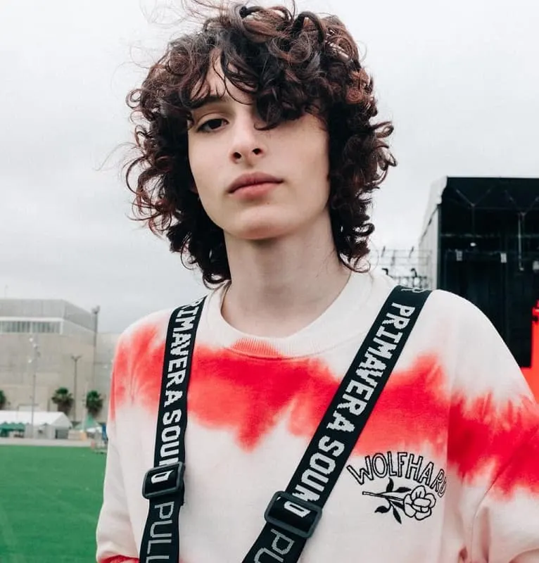 young actor with curly hair - Finn Wolfhard