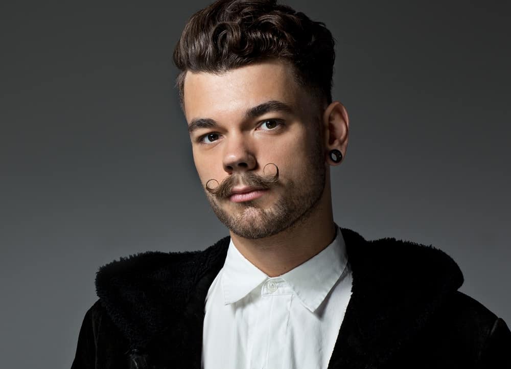 young guy with handlebar mustache